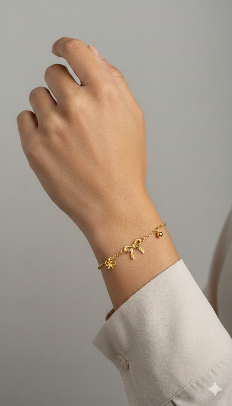 18ct Yellow Gold Bow & Bead Charm Bracelet